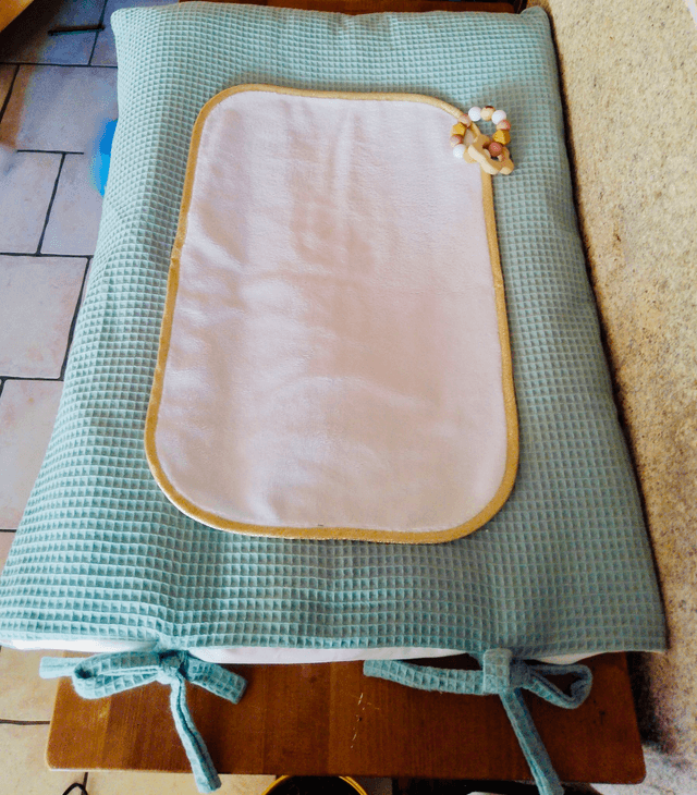 Housse à matelas à langer vert d&#039;eau